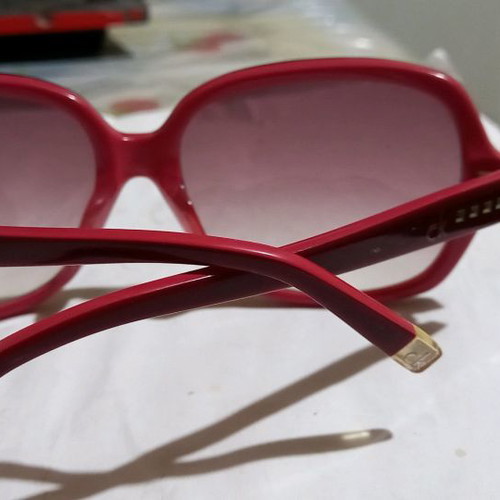 Calvin Klein sunglasses used, red frame with brown gradient lenses