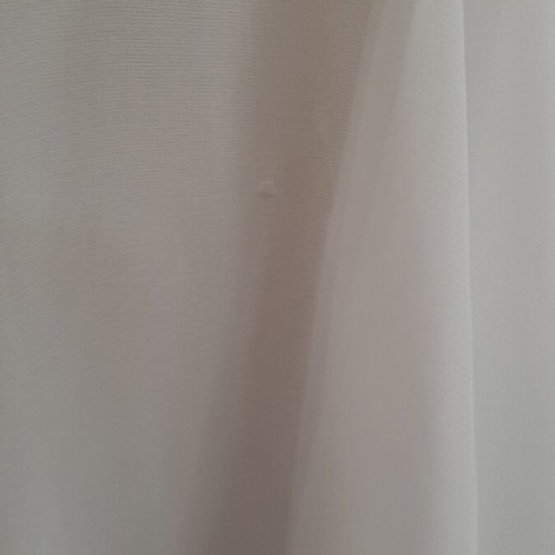 White women's shirt like new, asymmetrical with bows and cords