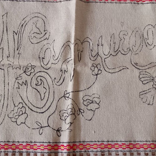Vintage embroidery saying 'Καλημερα' half complete, used