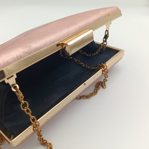 Baby Pink Clutch Bag used with embossed print and gold chain strap