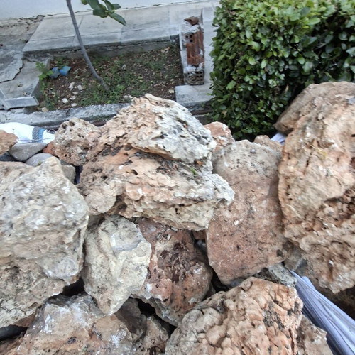Decorative stones with holes used for waterfalls and rock gardens