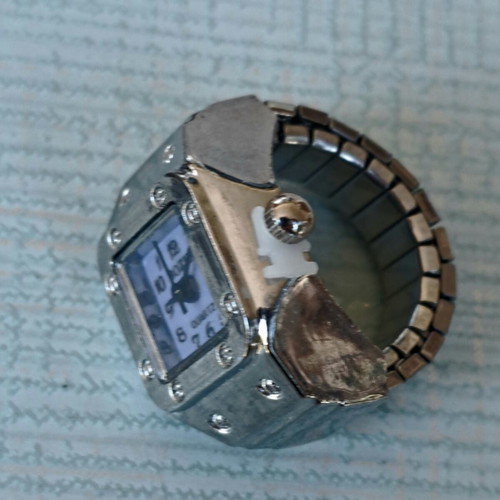 Ring watch quartz with purple dial and silver bracelet like new