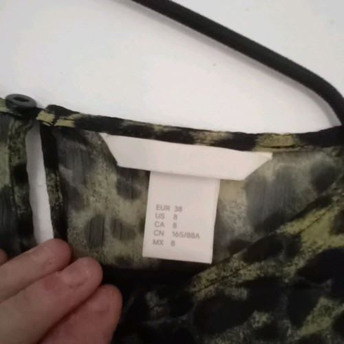 H&M blouse like new, size 38, with transparency and ruffles on sleeves