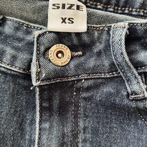 Jeans with butterfly and rhinestone details, size XS, like new