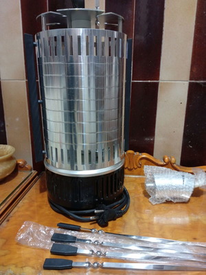 Electric meat grill new with 5 skewers and 5 fat collection bowls