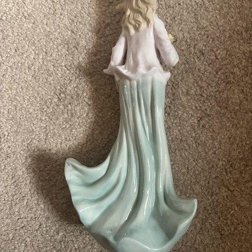 Porcelain figurine doll like new, height 25 cm
