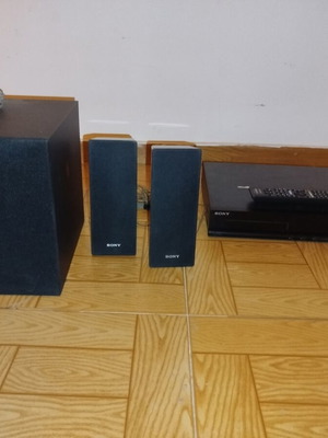 Sony 3D Blu-ray home cinema system with speakers and remote
