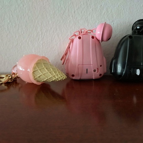 Illuminated keychains set of 3 like new, black and pink