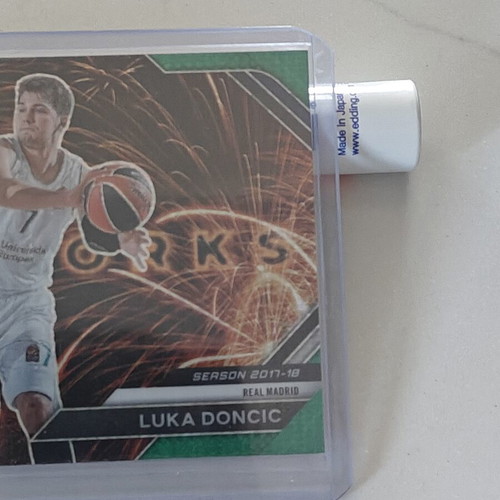 Luka Doncic Real Madrid Panini Prizm Fireworks card numbered 25