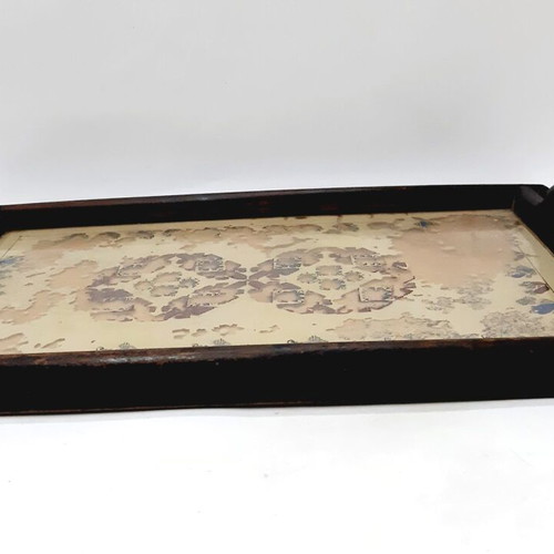 Vintage wooden tray with glass panel and painted design used