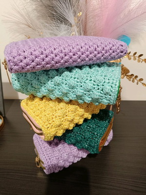 Handmade wallets in various colors and weaves made to order