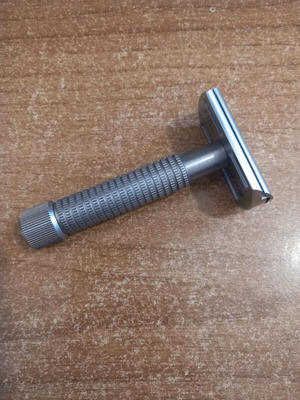 Rex Supply Co. Envoy shaving razor used with small top cap damage