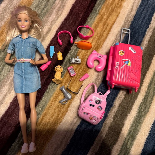 Barbie doll like new with travel accessories and puppy