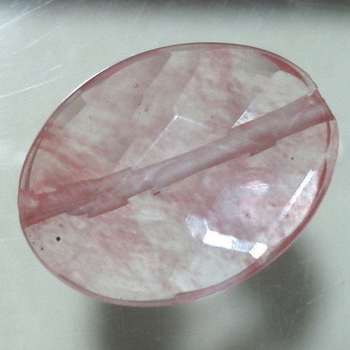 Quartz mineral with oxide inclusions like new