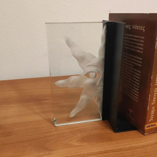 Bookends set like new, metal and glass with embossed design