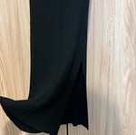 Black knitted dress like new, one size, with side slit