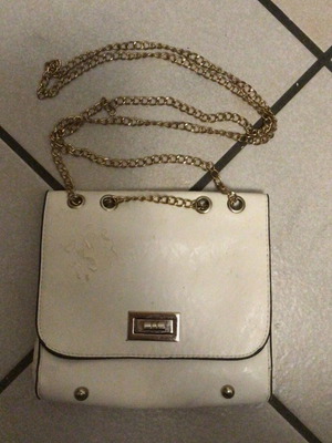 White bag used, worn exterior