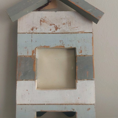Wooden frame with worn look in off-white, gray and blue colors