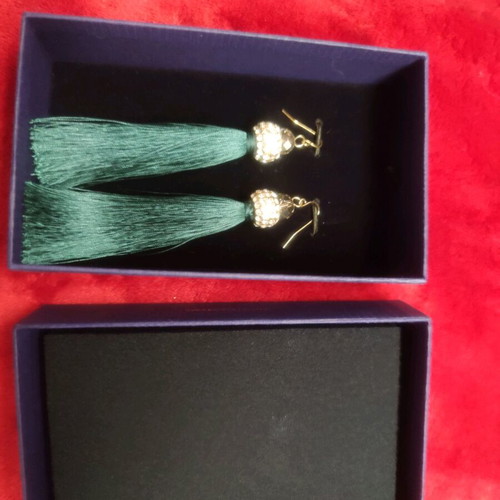 Avon earrings with green tassel like new