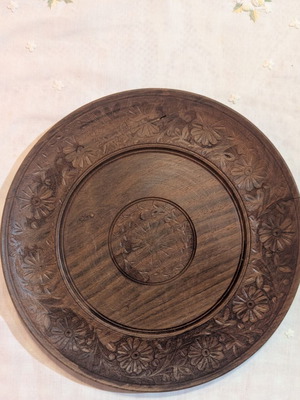 Vintage wooden carved plate, 25 cm diameter