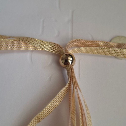 Dior bracelet with charm and adjustable ribbon new, gold and beige