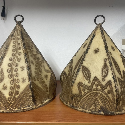 Leather wall sconces like new with Moroccan designs for exotic atmosphere