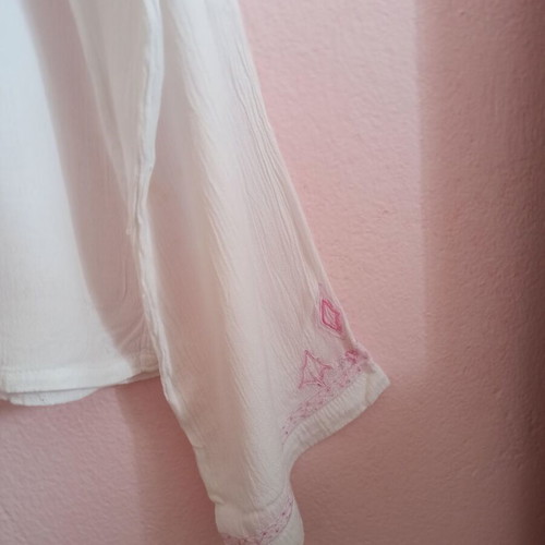White women's blouse one size like new with bell sleeves