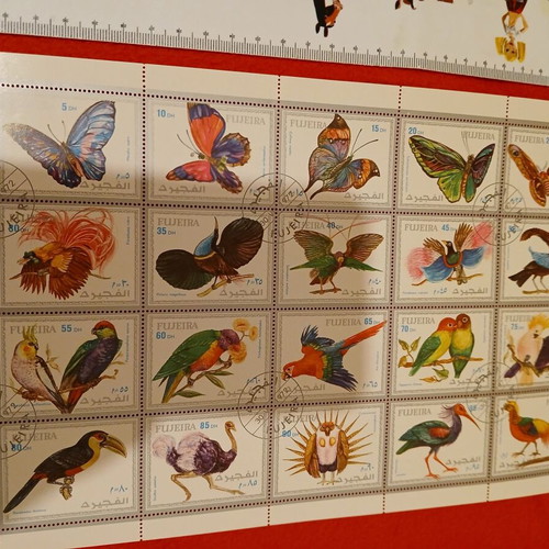 Sheet of 20 exotic bird and butterfly stamps new, FUJEIRA 1972