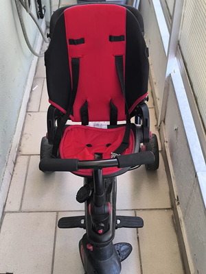 SmarTrike STR7 J Red tricycle like new with sun canopy and storage bag