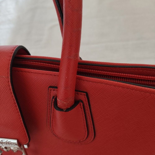 Folli Follie Ladies Handbag used, burnt orange with flower fastening