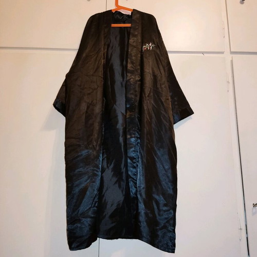 2 women's robes like new, one cream and one black with flower detail