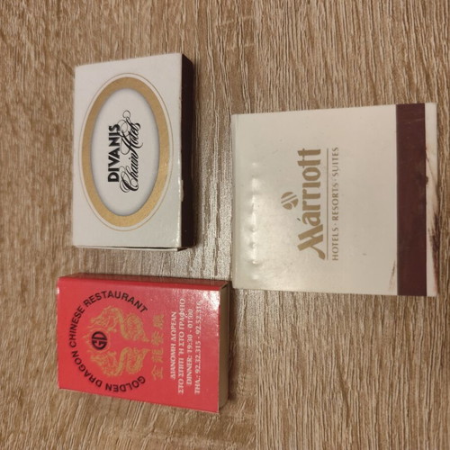 Collection of 25 used vintage lighters and 3 matchboxes from hotels and restaurants