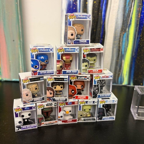 Funko Pop Bitty used, pack of 13 with 4-slot case