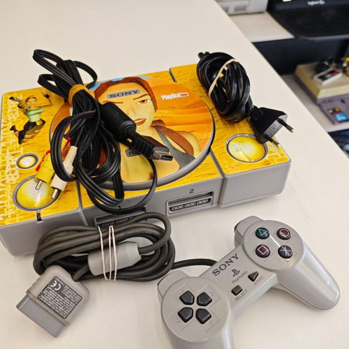 Sony PS1 with modchip used, with original controller and cables