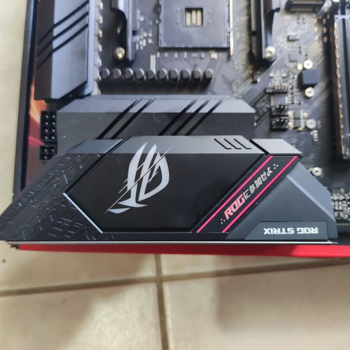 ASUS ROG Strix B550-F Gaming motherboard used, non-functional for repair or parts