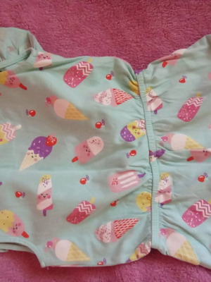 One-piece suit green with ice cream pattern 4 years like new