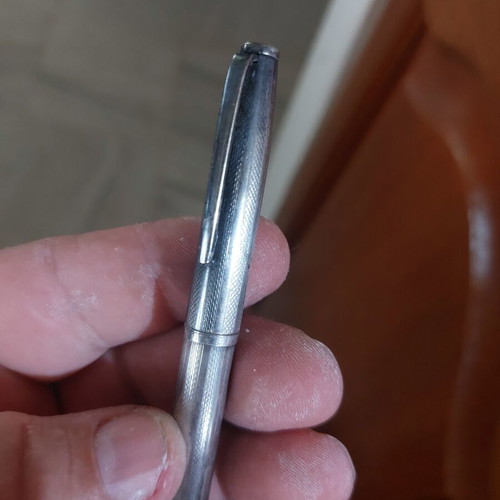 Silver pen used, needs ink