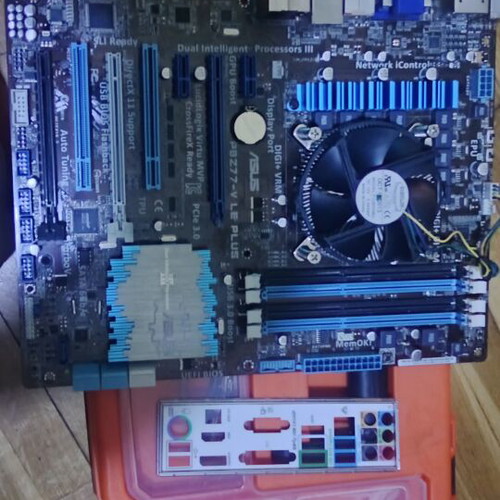 Asus P8Z77-V LE PLUS motherboard with cooling fan and 8GB DDR3 RAM