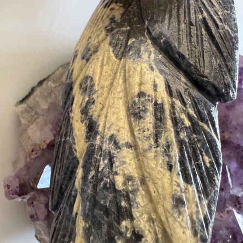 Decorative quartz parrot on raw amethyst base like new