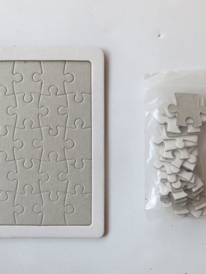 Blank jigsaw puzzle like new, cardboard, 20 pieces
