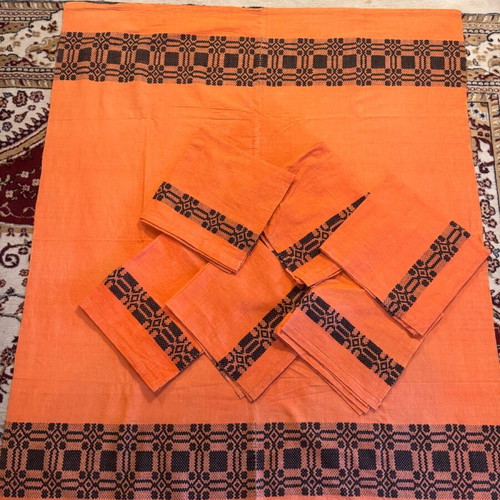 Handwoven tablecloth and napkin set from grandmother's loom