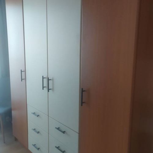 Custom four-door bakelite wardrobe with loft