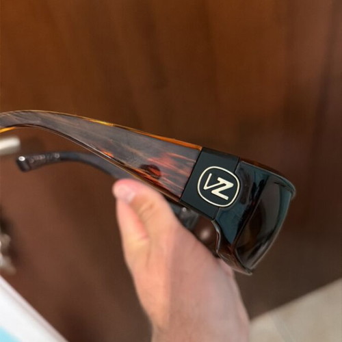 Sunglasses used, brown color
