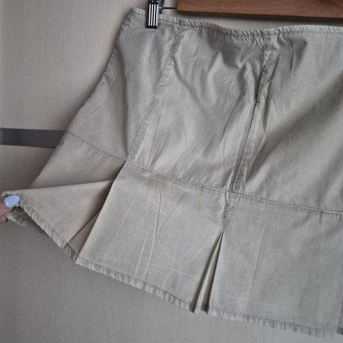 Mini skirt beige with pleats used, size M