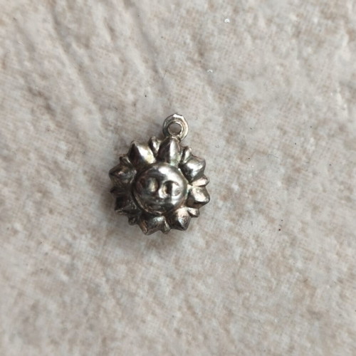 Sun pendant used, silver, without chain