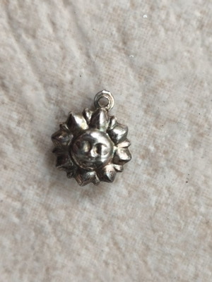 Sun pendant used, silver, without chain
