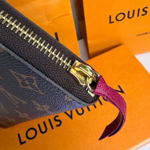 Louis Vuitton Clémence wallet used, monogram canvas with pink zipper