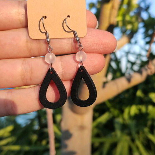 Earrings new with steel hooks and black wooden tear drop