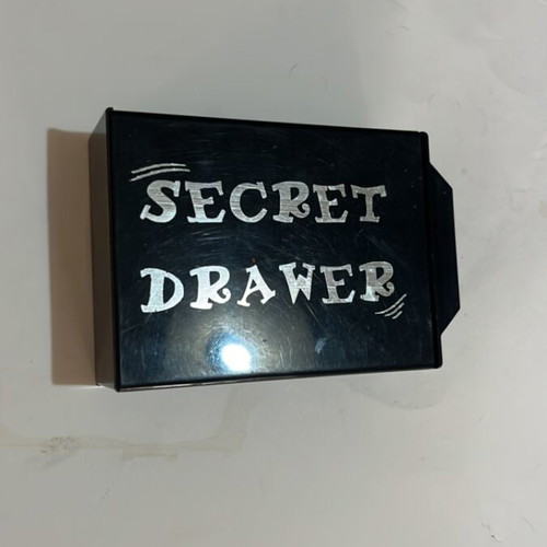 Secret drawer used, magician's box that makes objects disappear