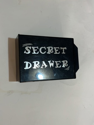 Secret drawer used, magician's box that makes objects disappear